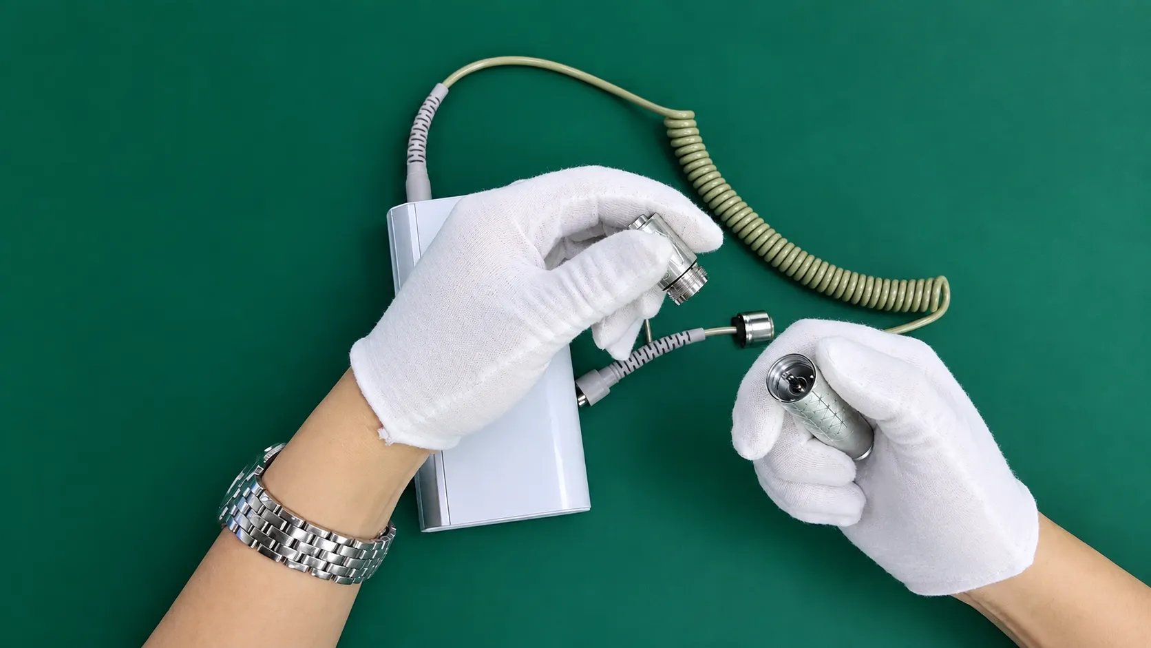 Inspecting precision ball bearings and BLDC motor end cap inside electric grinder handpiece